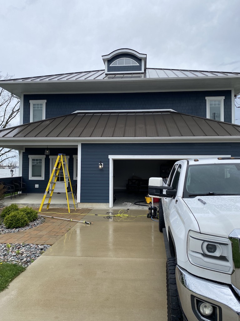Professional house power washing service in action